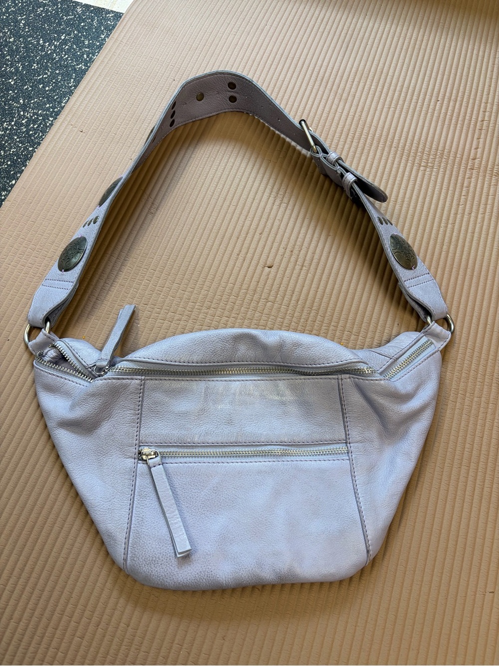 Free People Wilder embellished sling bag.
